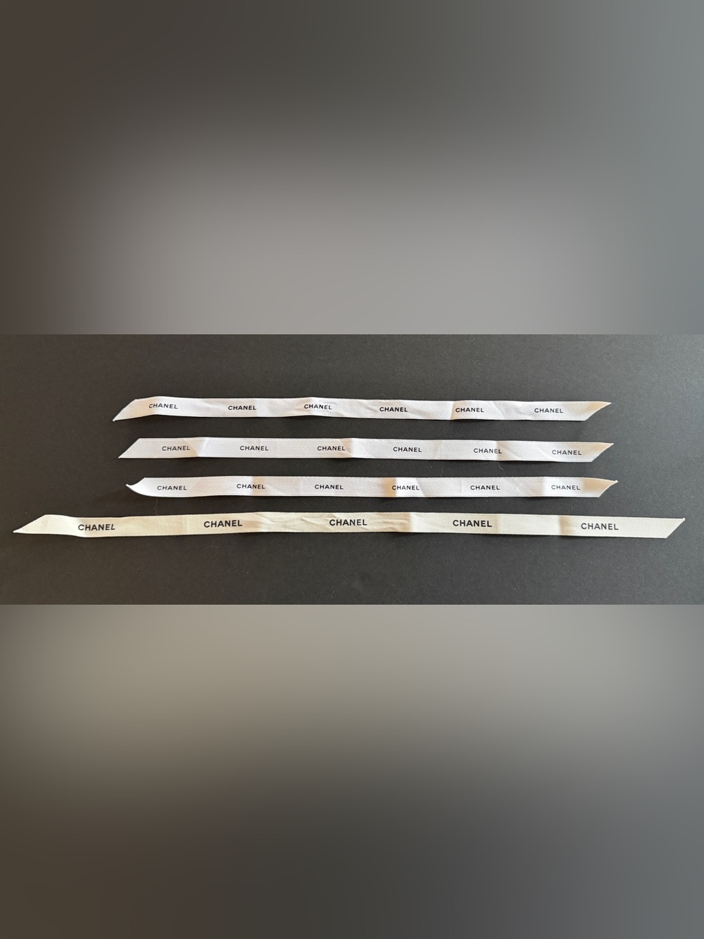 CHANEL White Logo Ribbon Strips - Set of 4